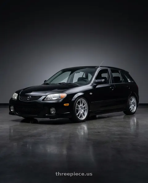 2002 Mazda Protege5 with Enkei PF01 5x114.3 17x7.5+38 Silver wheels