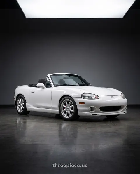 2003 Mazda Miata with Konig Rewind 4x100 15x7+20 Silver wheels