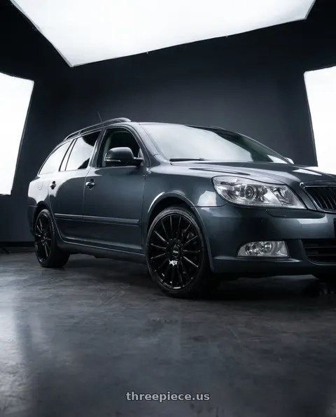 2009 Skoda octavia with V�xx Casina 5x100/5x114.3 16x7+40 Gloss Black wheels