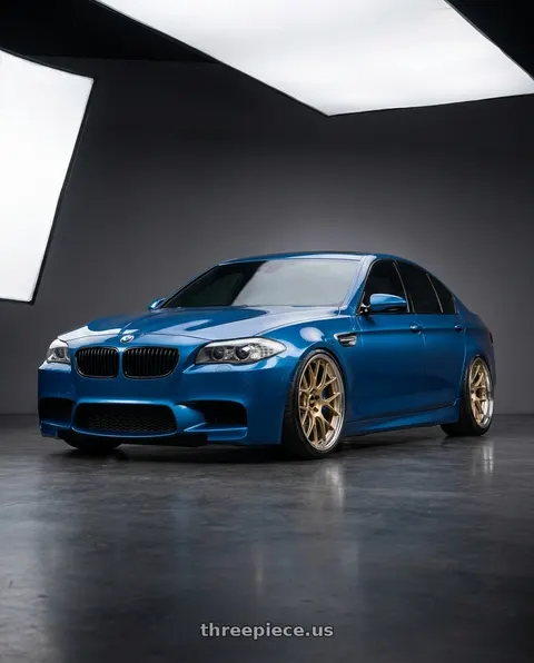2012 BMW 550i with BBS RE-V7 5x112 21x10.5 +15 Gloss Gold wheels