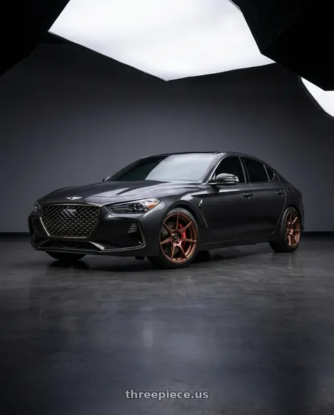 2019 Genesis G70 with Enkei TFR 5x112 19x8.5+35 Copper wheels
