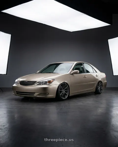 2003 Toyota Camry with Enkei DRACO 5x112 18x8.0+45 Anthracite wheels