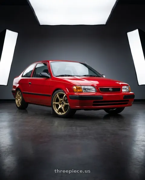 1996 Toyota Tercel with Advan RGIII 4x100 18x7.0+42 Gold wheels