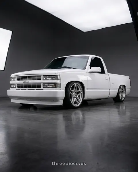 1989 Chevrolet C1500 with Kansei K15H Astro 5X112 19x8.5 35 Hyper Silver wheels