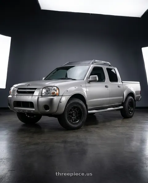2001 Nissan Frontier with KMC KM549 GRS 6X139.7 17X8.5 +0 SATIN BLACK wheels