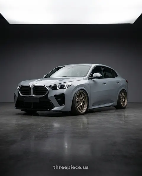 2025 BMW iX with fifteen52 HOLESHOT 5x112 19x8.5 +45 MAGNESIUM GREY (SATIN BRONZE) wheels
