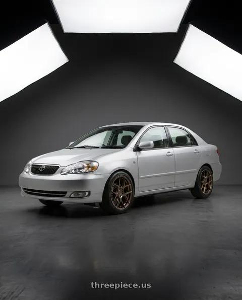 2005 Toyota Corolla with MRR FS1 5x130 18x8.5  +45 Gloss Bronze wheels