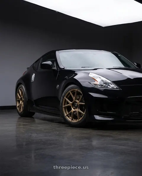 2010 Nissan 370Z with Konig Ampliform 5x114.3 19x9.5+25 Gloss Bronze wheels