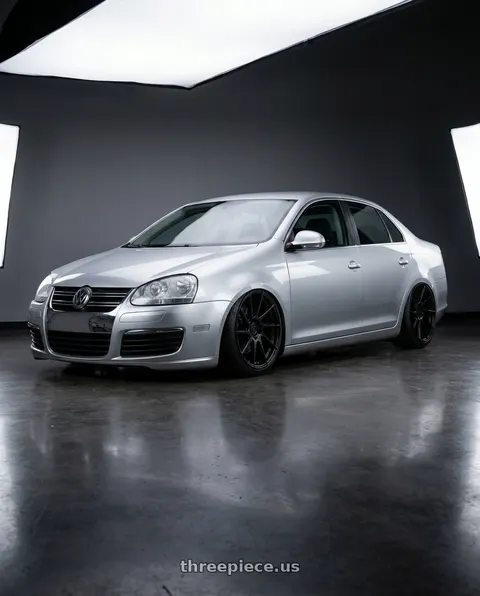 2009 Volkswagen Jetta with Aodhan AH09 5x112 18x9.5 +35 Matte Black wheels