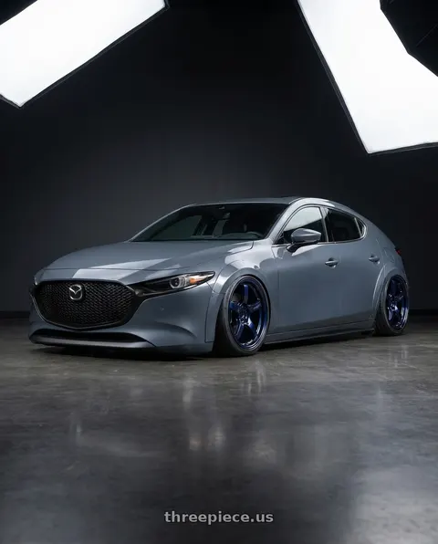 2023 Mazda 3 with Gram Lights 57CR 5x114.3 18x9.5+12 Eternal Blue Pearl wheels