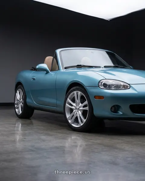 2002 Mazda Miata with TOUREN TR22 3222 4x100/4x114.3 14x6 +40 GLOSS HYPER SILVER wheels