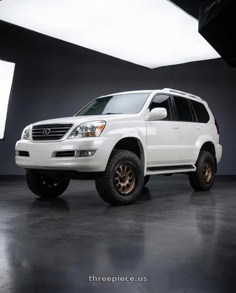 2015 Lexus GX460 with LOCK OFFROAD 50CAL 6x139.7 17x9 -12 Matte Desert Bronze W Matte Black Ring wheels