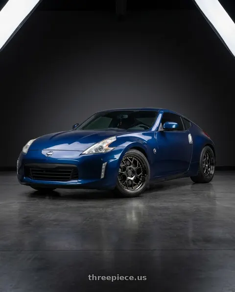 2016 Nissan 370Z with Aodhan DS01 5x114.3 19x10.5+22 Black Vacuum W/ Gold Rivets wheels