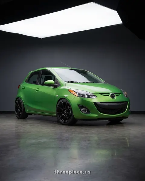 2011 Mazda 2 Sport with Enkei EDR9 4x100/114.3 16x7+45 Matte Black wheels