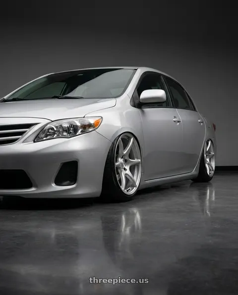 2012 Toyota Corolla with Kansei K11S Tandem 5x114.3 19x9.5 22 Hyper Silver wheels