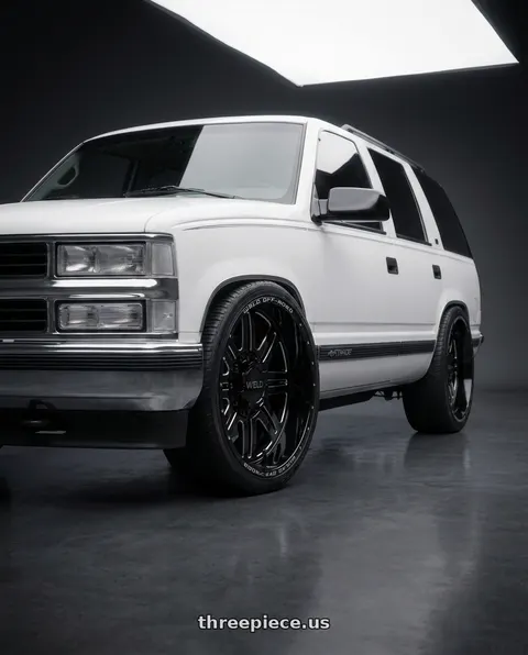 1999 Chevrolet Tahoe with WELD Off-Road Chasm 5x127 20x9 0 Gloss Black/Milled wheels
