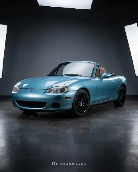 2002 Mazda Miata with TOUREN TR22 3222 4x100/4x114.3 14x6 +40 GLOSS BLACK wheels