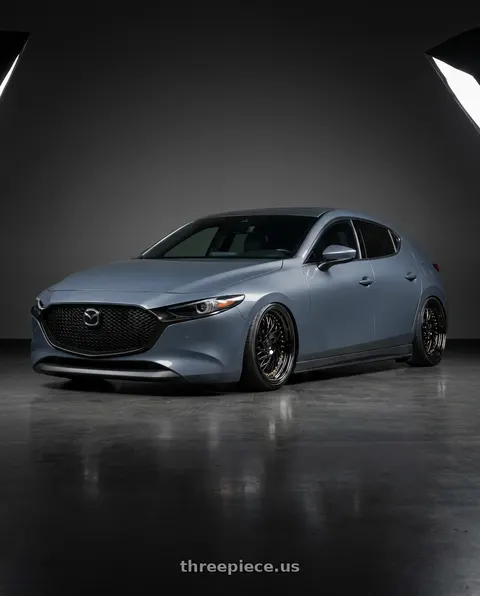 2023 Mazda 3 with Aodhan DS03 5x114.3 18x9.5 +30 Black Vacuum w/ Gold Rivets wheels