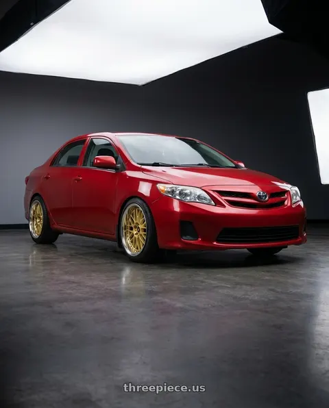 2012 Toyota Corolla with Work Vs-Xx 5x100 18x12+13 A Disk Gold wheels