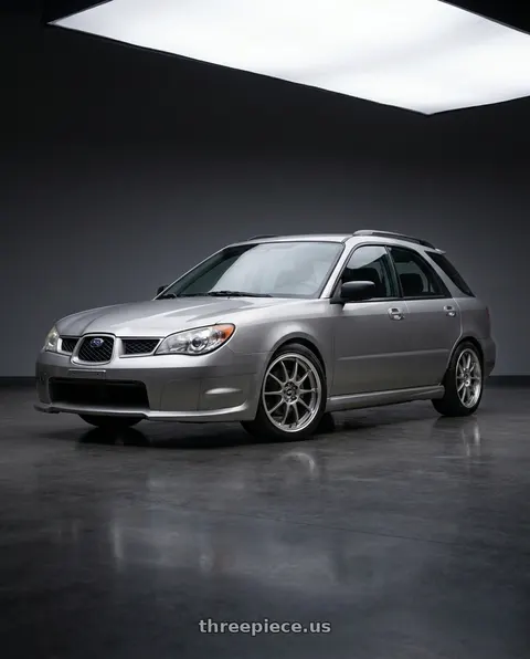 2007 Subaru Impreza with Enkei J10 4x100/114.3 15x6.5+38 Silver w/ Machined Lip Dia wheels