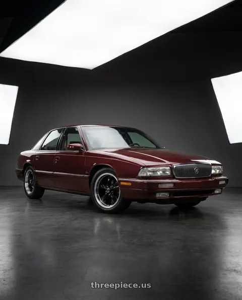 1995 Buick Regal with American Racing AR105 TORQ THRUST M 5X115 16X7 +35 GLOSS BLACK W/ MACHINED LIP wheels