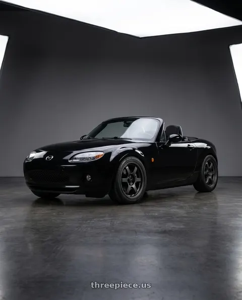 2006 Mazda MX-5 Miata with Gram Lights 57DR-X2 5x114.3 16x7+32 Black Graphite wheels