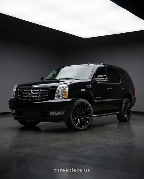 2007 Cadillac Escalade with O.E. Revolution 158 6x139.7 22x9 +24 Gloss Black wheels