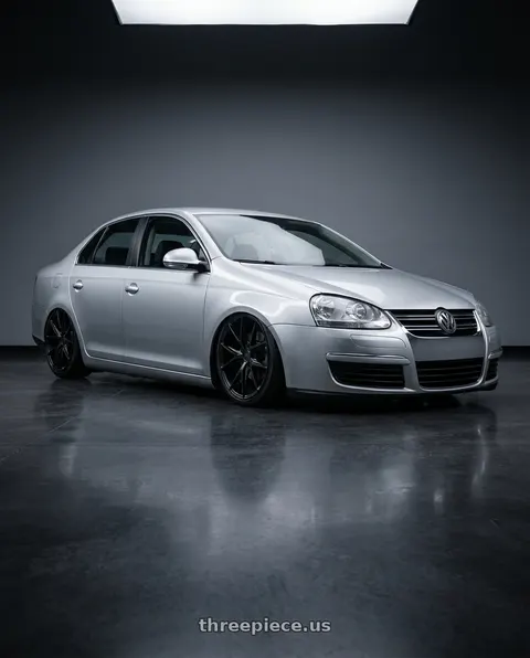 2009 Volkswagen Jetta with Niche 1PC M117 MISANO 5X112 18X8 +30 MATTE BLACK wheels