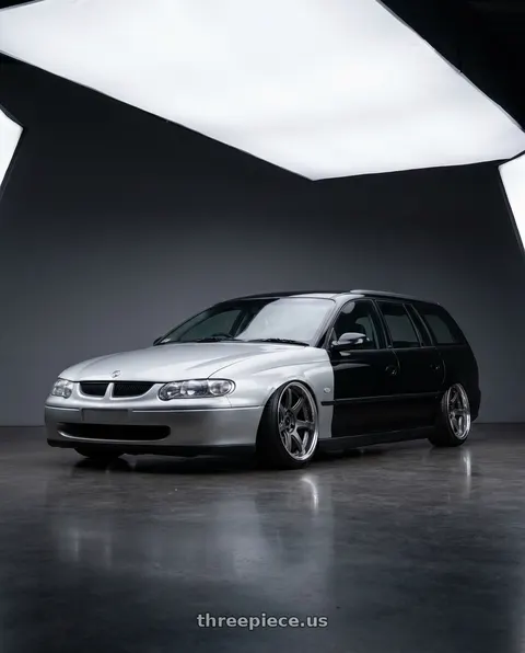 2002 holden vx berlina wagon with Work T7r 2P 5x120 19x9.5 +45 Matte Gunmetal wheels