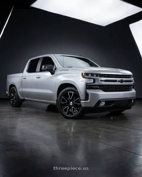 2020 Chevrolet Silverado 1500 with O.E. Revolution C-14 6x139.7 22x9 +28 Gloss Black & Machined wheels