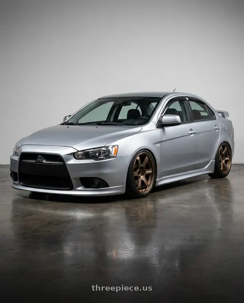 2009 Mitsubishi Lancer GTS with Volk Racing TE37 SAGA S-PLUS 5x114.3 18x9.5+27 Bronze wheels