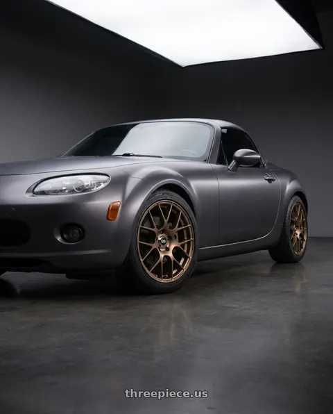 2007 Mazda Miata MX-5 with Enkei Raijin 5x114.3 18x8+40 Bronze wheels