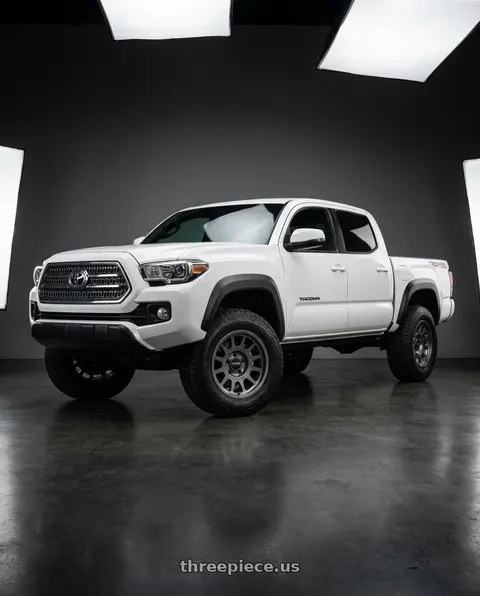 2018 Toyota Tacoma with Method MR703 Bead Grip 17x8.5 / 6x5.5 / +35mm Offset / 106.25mm Centerbore - Gloss Titanium Wheel - MR70378560835 wheels