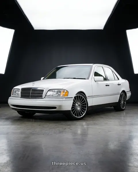 1995 Mercedes-Benz C220 with Mandrus 23 5X112 17X8 +25 GUNMETAL W/ MIRROR CUT FACE wheels