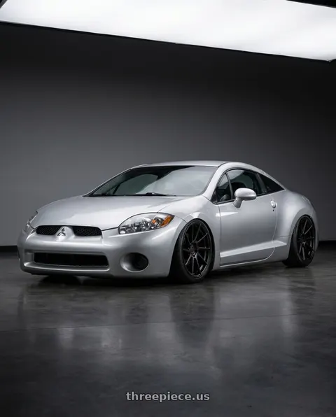 2010 Mitsubishi Eclipse with Aodhan AH09 5x114.3 18x8.5 +35 Matte Black wheels