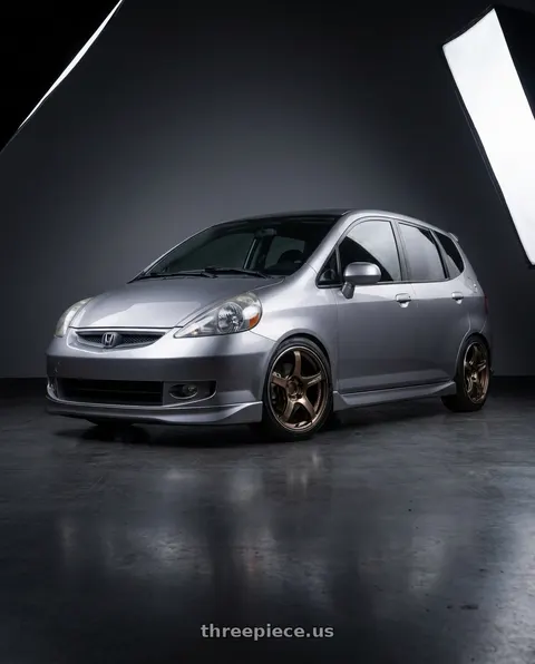 2007 Honda Fit Sport with Advan Racing TC4 4x100 16x7.0 +42 UMBER BRONZE METALLIC & RING wheels