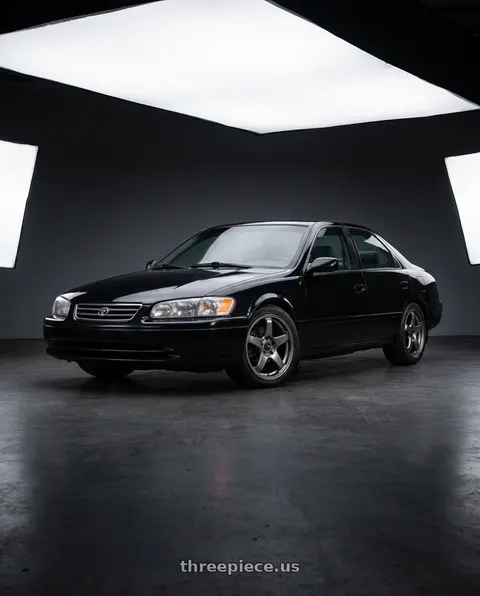 1997 Toyota Camry with Enkei PF05 5x100 16x7+48 Dark Silver wheels