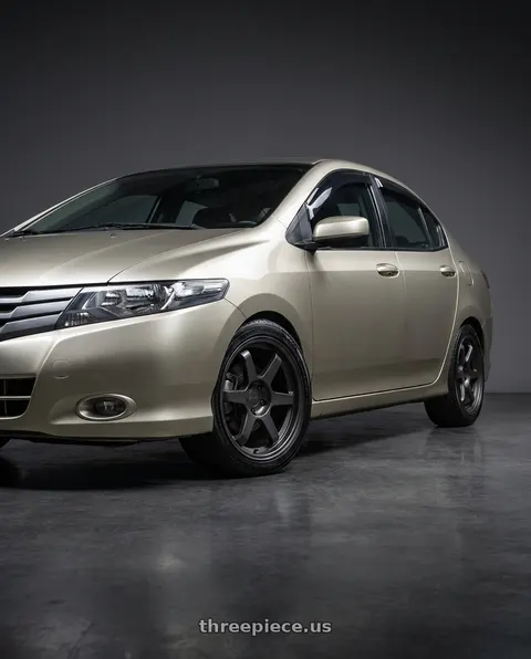 2009 Honda City DX 1 with 9six9 SIX-1 5x114.3 17X8 +25 Carbon Gray wheels