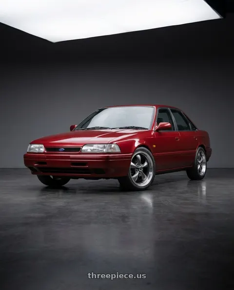 1991 Ford Telstar with American Racing AR105 TORQ THRUST M 5X127 18X8 0 ANTHRACITE W/ MACHINED LIP wheels