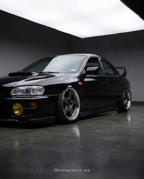 1998 Subaru Impreza with Vors SP1 5x100/5x114.3 17x8  +35 Hyper Black Machine Lip wheels