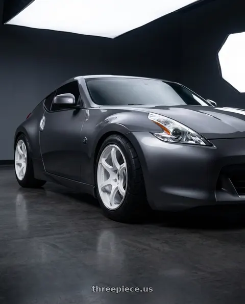 2009 Nissan 370Z with Advan Racing RG-4 5x114.3 18x10.5 +15 RACING WHITE METALLIC & RING wheels