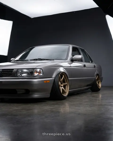 1994 Nissan Sentra b13 with Kansei K11B Tandem 5X108 18x8.5 35 Bronze wheels