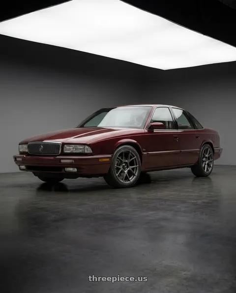1995 Buick Regal with Konig Ampliform 5x100 18x8.5+44 Dark Metallic Graphite wheels