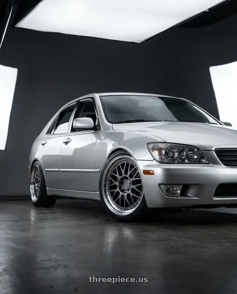 1999 Toyota Altezza Silver with Aodhan AH02 5x114.3 18x8.5+35 Hyper Black w/ Machined Lip wheels