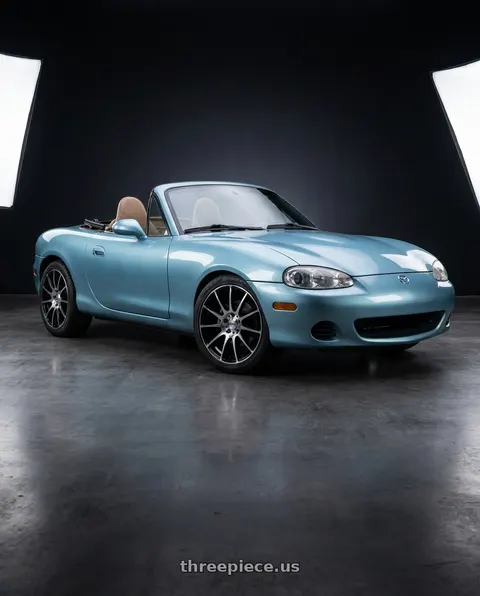 2002 Mazda Miata with Maxxim 44B Champ 4X100/4x114.3 14x6 +38 Machined Face w/Gloss Black wheels