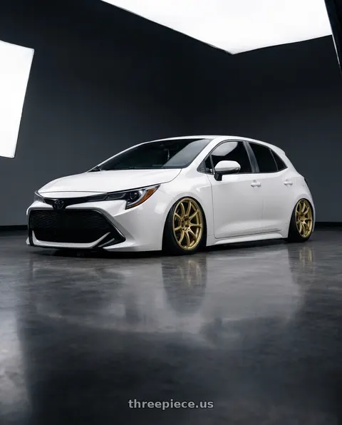 2023 Toyota Corolla with Advan RCIII 5x114.3 18x7.5+45 Gold wheels