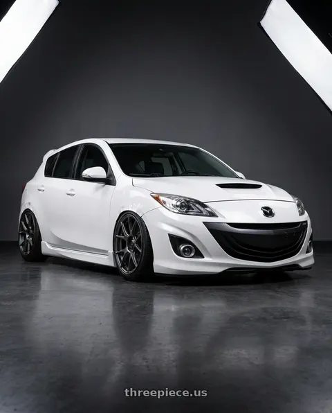 2012 Mazda 3 Mazdaspeed with Konig Ampliform 5x114.3 18x9.5+35 Dark Metallic Graphite wheels
