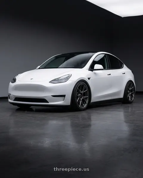 2024 Tesla Model Y with Konig Ampliform 5x114.3 20x9.5+25 Dark Metallic Graphite wheels