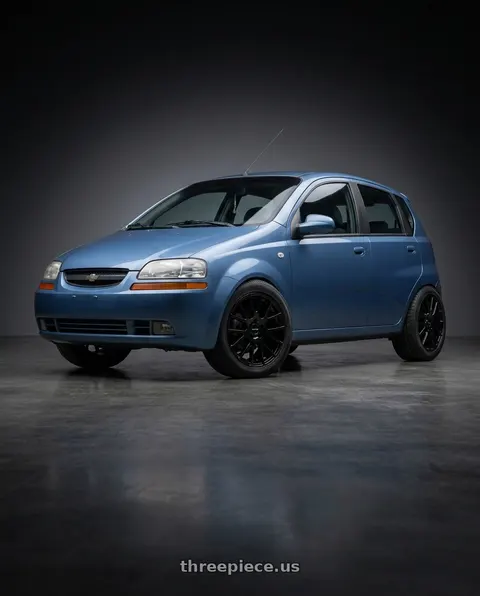 2005 Chevrolet Aveo with Vision Street-Designs 18 Hellion 4x100 14x5.5+38 Gloss Black wheels