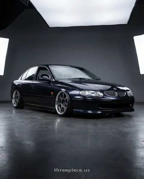 1997 holden vt commodore raven with Work T7r 2P 5x120 19x11.5 +22 Matte Gunmetal wheels